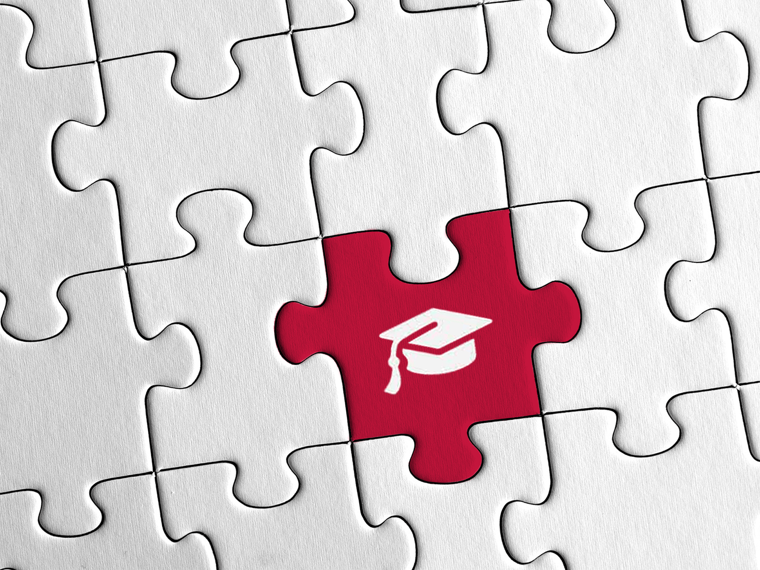 Puzzle z ikoną szkolnictwa wyższego.